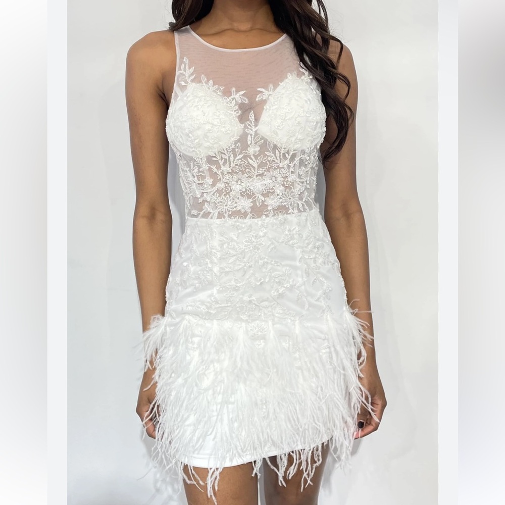 Jovani Scoop neck flower embellished bodice with mesh and a feathered Miniskirt.